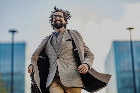 Confident professional moving forward in career